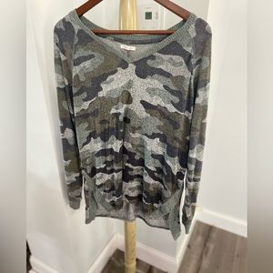 Camouflage v-neck sweater.